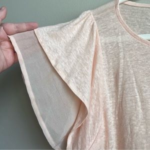 Eri and Ali Anthropologie light pink top with ruffle sleeves, size M